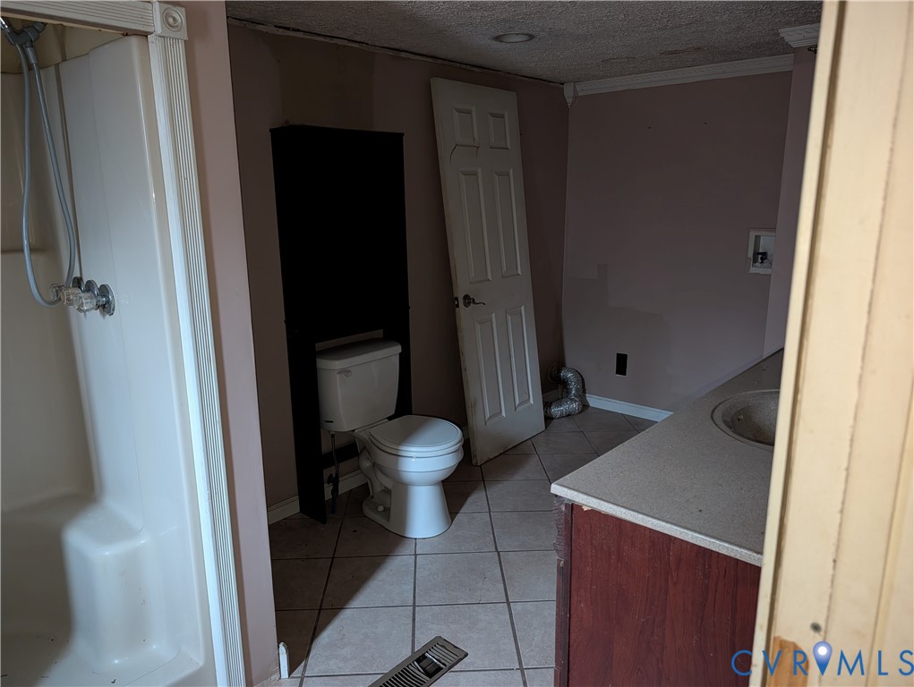 1149 Woodcrest Road Hurley, VA 24620 - Photo 15 of 32 a bathroom with a sink and a toilet
