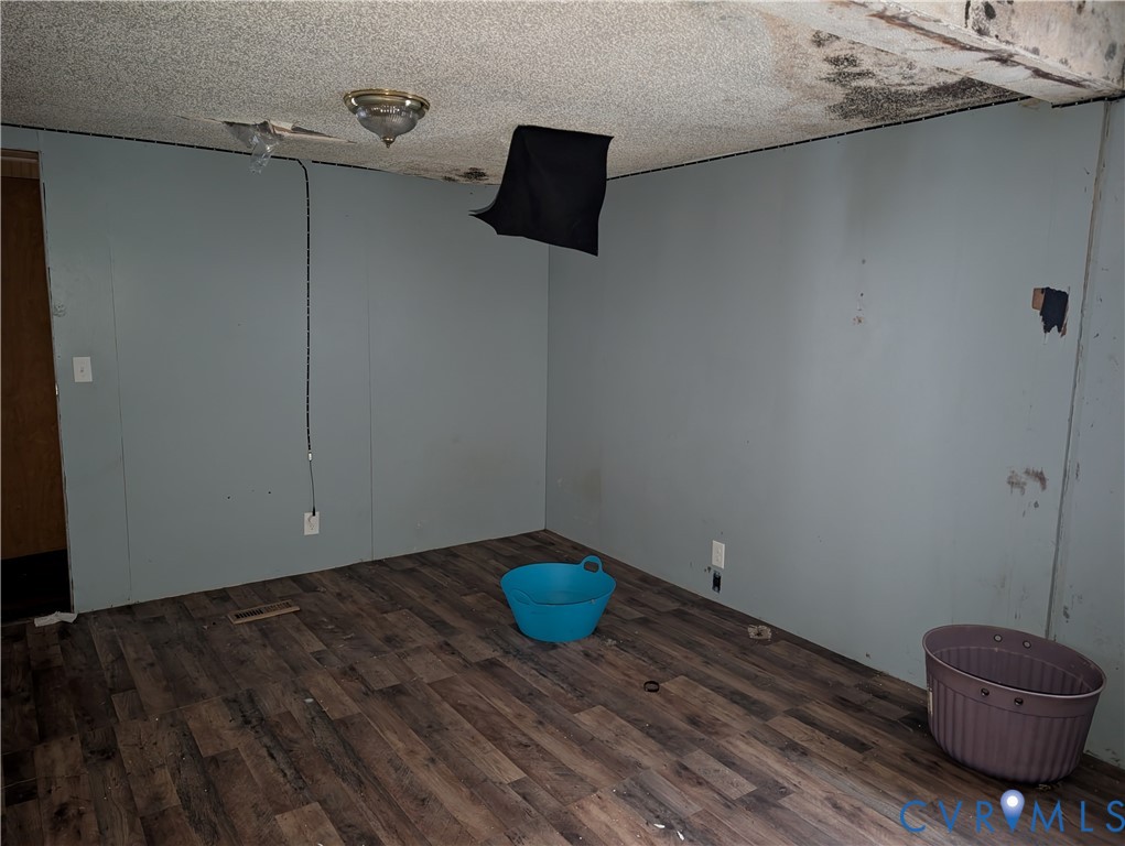 1149 Woodcrest Road Hurley, VA 24620 - Photo 20 of 32 a view of a room with wooden floor and cabinets