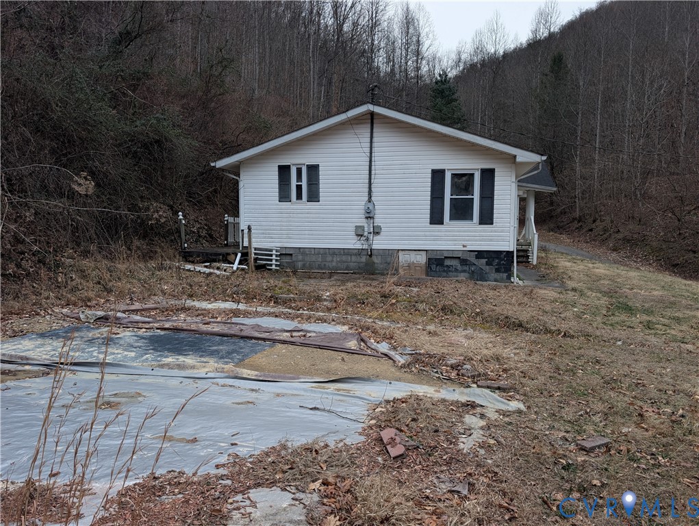 1149 Woodcrest Road Hurley, VA 24620 - Photo 22 of 32 a view of a small white house