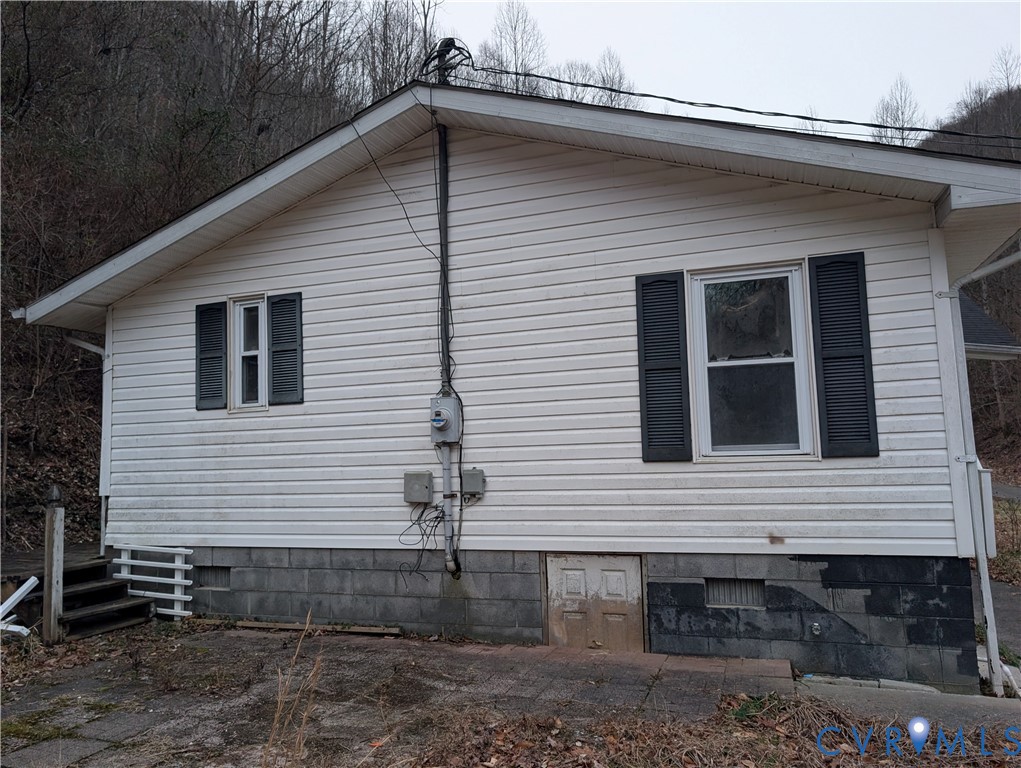 1149 Woodcrest Road Hurley, VA 24620 - Photo 23 of 32 a view of a house with a yard