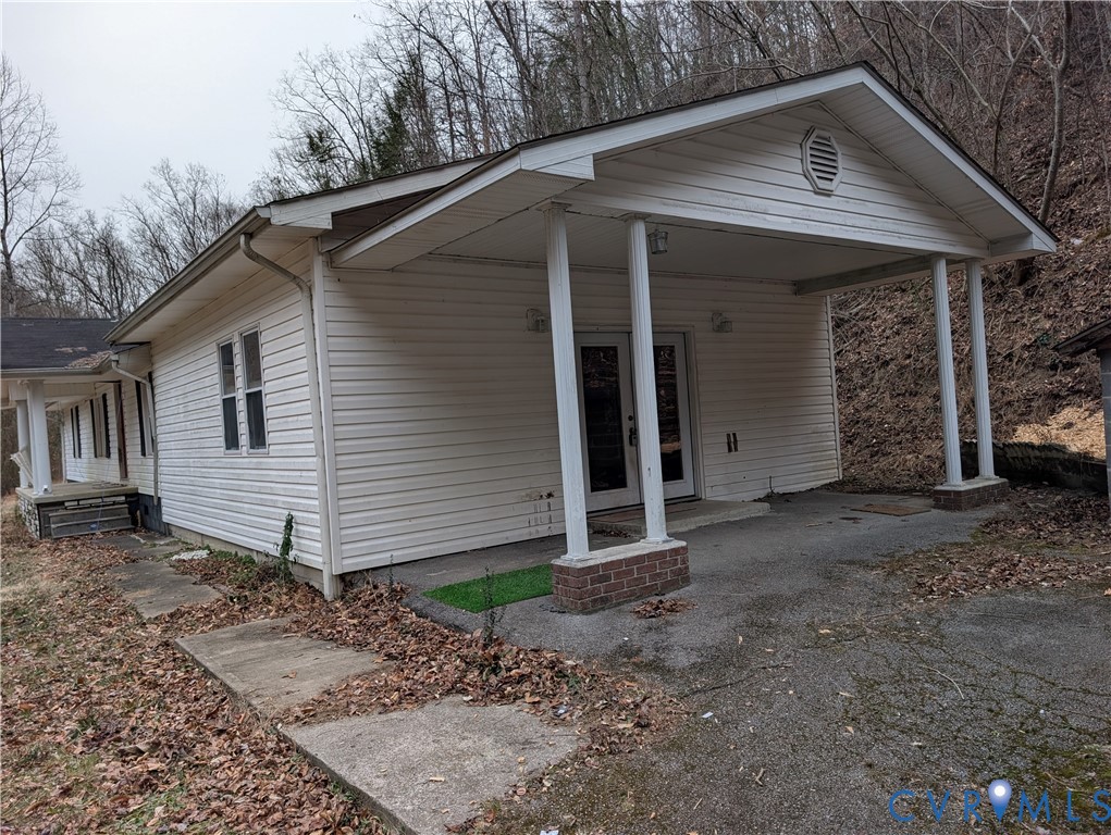 1149 Woodcrest Road Hurley, VA 24620 - Photo 24 of 32 a view of a house with a yard