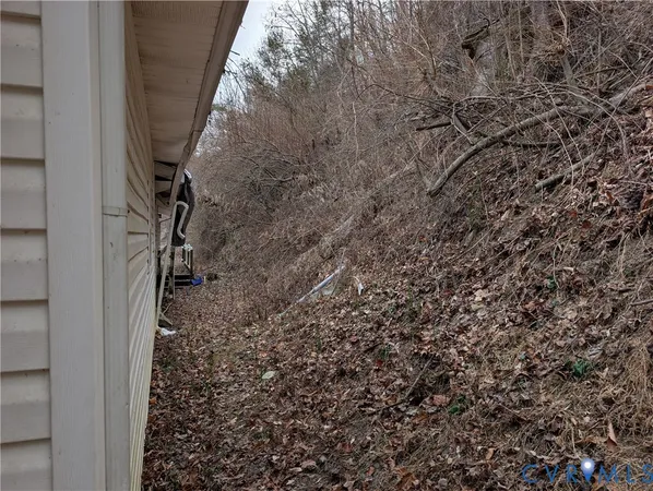 a small white house with a outdoor space