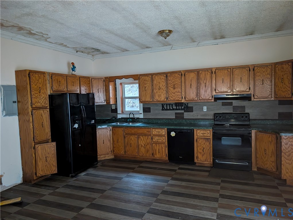 1149 Woodcrest Road Hurley, VA 24620 - Photo 7 of 32 a kitchen with granite countertop a refrigerator stove top oven and sink