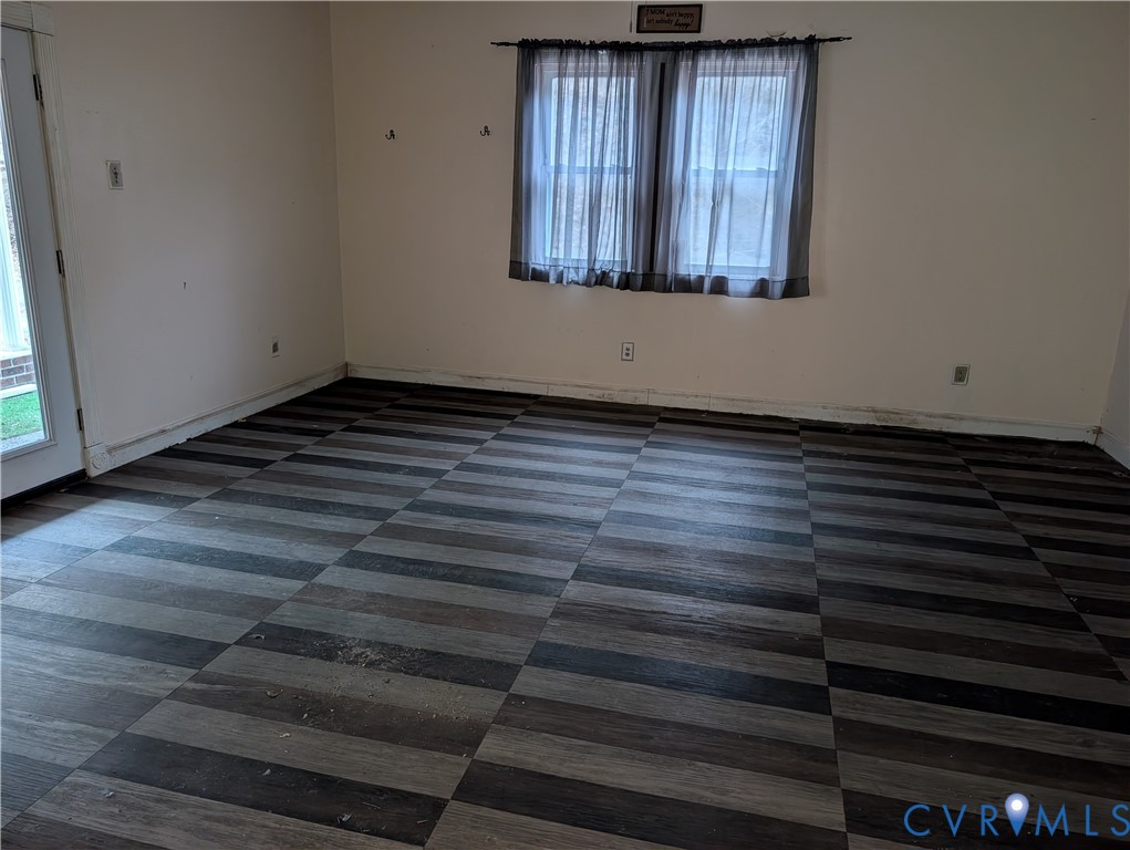 1149 Woodcrest Road Hurley, VA 24620 - Photo 10 of 32 a view of a livingroom with wooden floor