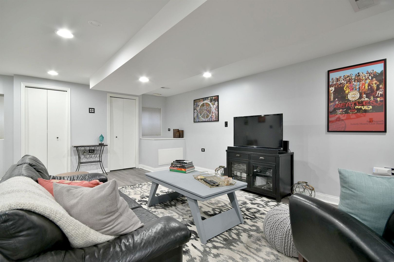 533 Lavina Drive Bolingbrook, IL 60440 - Photo 30 of 44 a living room with furniture and a flat screen tv