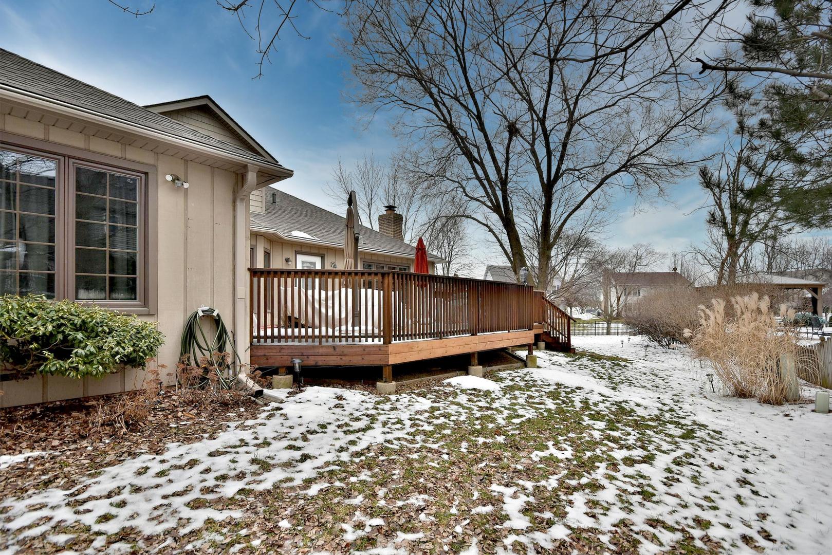 533 Lavina Drive Bolingbrook, IL 60440 - Photo 42 of 44 a view of a house with a yard and wooden fence