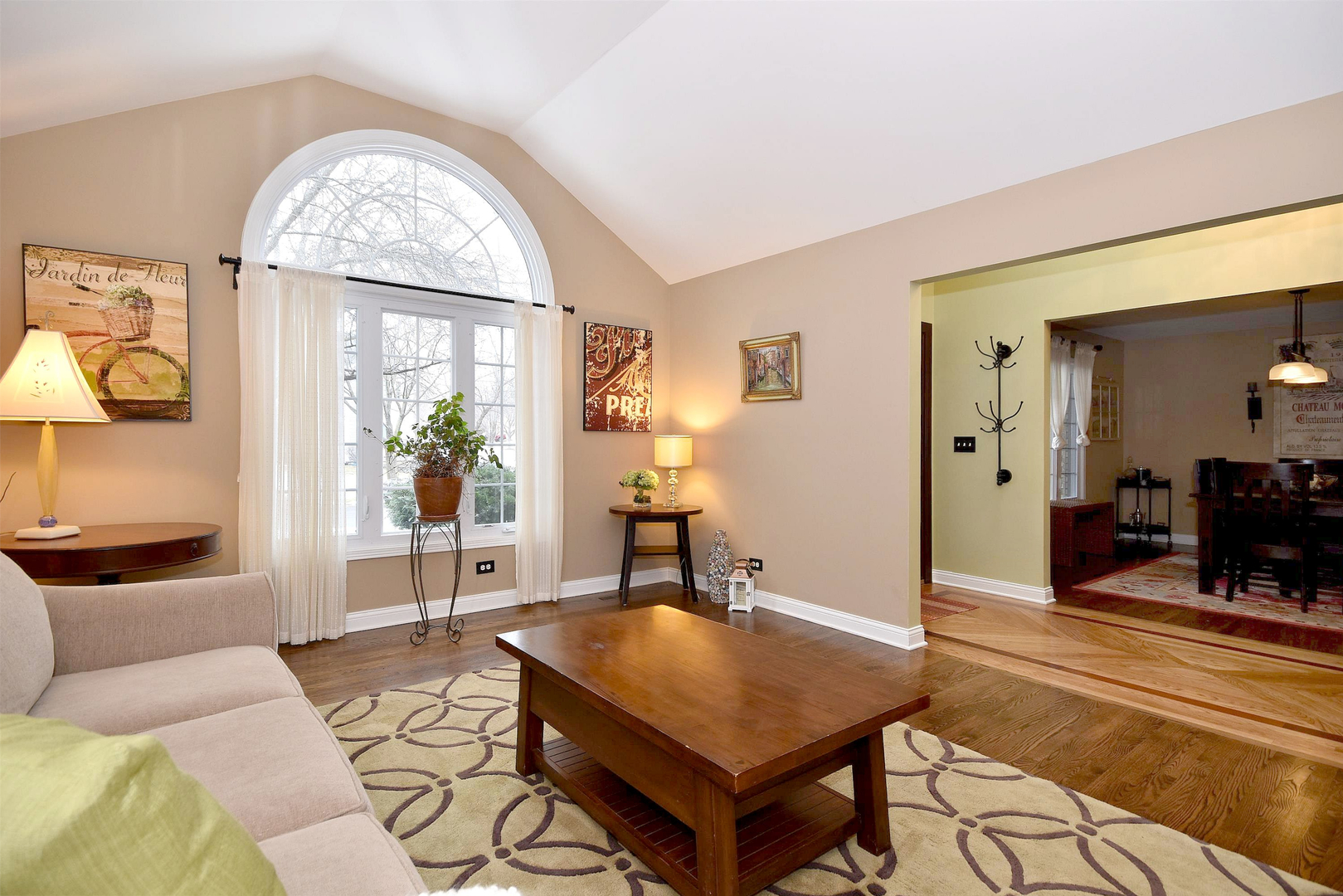 533 Lavina Drive Bolingbrook, IL 60440 - Photo 8 of 44 a living room with furniture a dining table and a large window