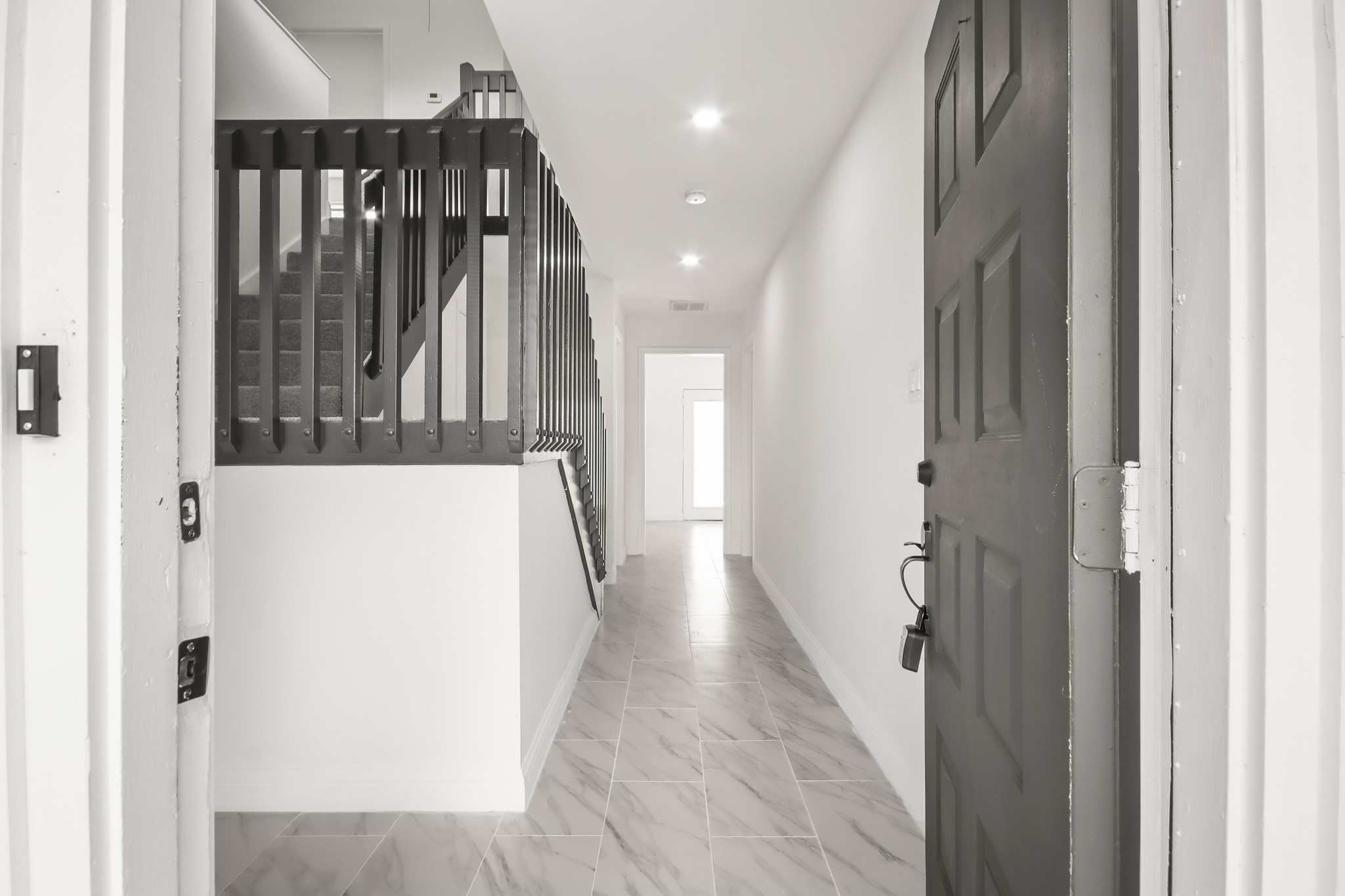 24127 Spring Fork Drive Spring, TX 77373 - Photo 2 of 17 Step inside to a bright, airy entryway featuring sleek flooring, modern lighting, and an open view that leads you effortlessly into the heart of the home.