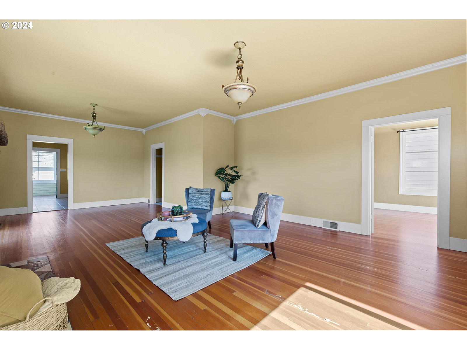 802 Pioneer Street Ridgefield, WA 98642 - Photo 8 of 40 a living room with furniture and wooden floor