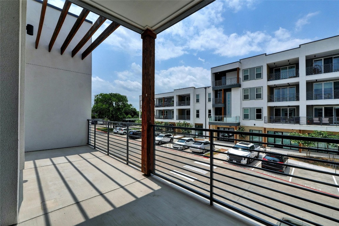 4901 Springdale Road, Unit 102 Austin, TX 78723 - Photo 25 of 30 a view of a balcony with chairs