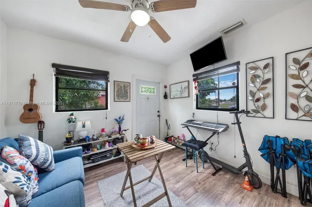 a view of a livingroom with furniture and a livingroom