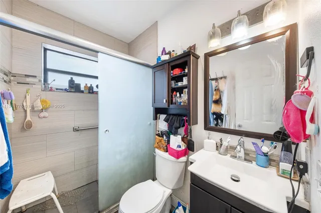 a view of a backyard and palm tree