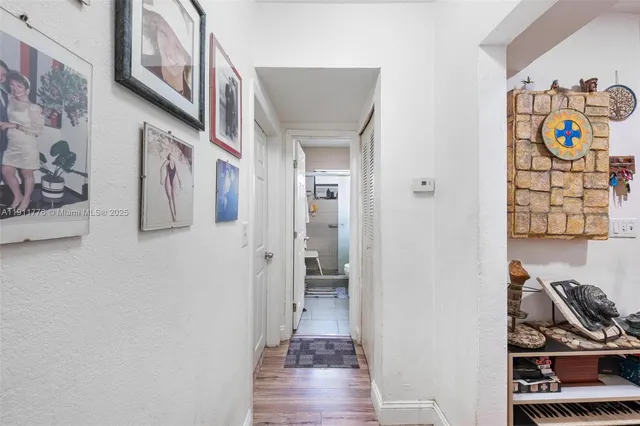 a view of a car parked in front of a house