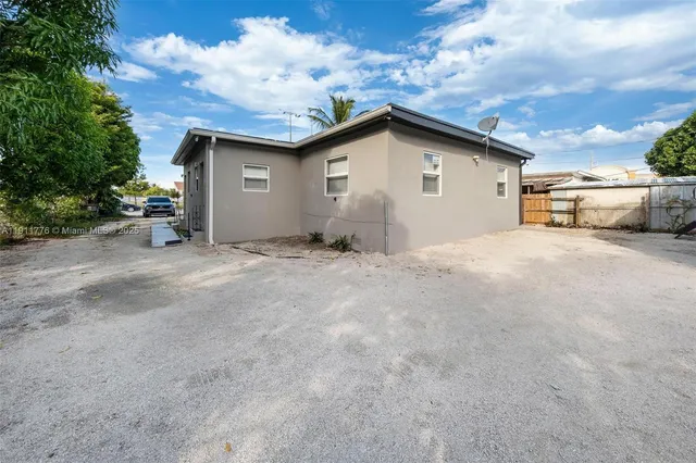 a bed room with a bed and a window