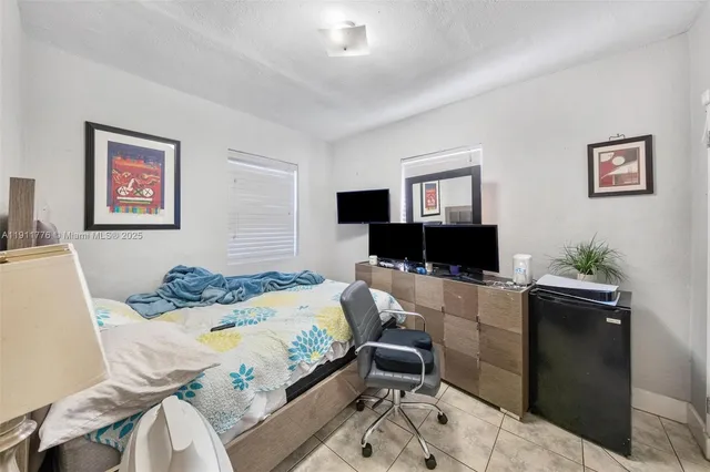 a view of a house with a yard and garage