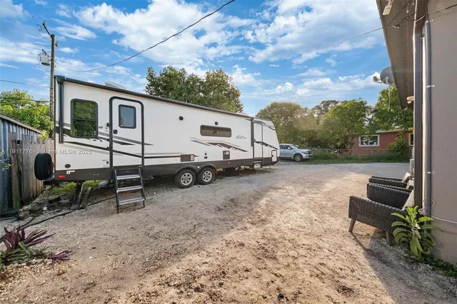 an aerial view of a house with a garden