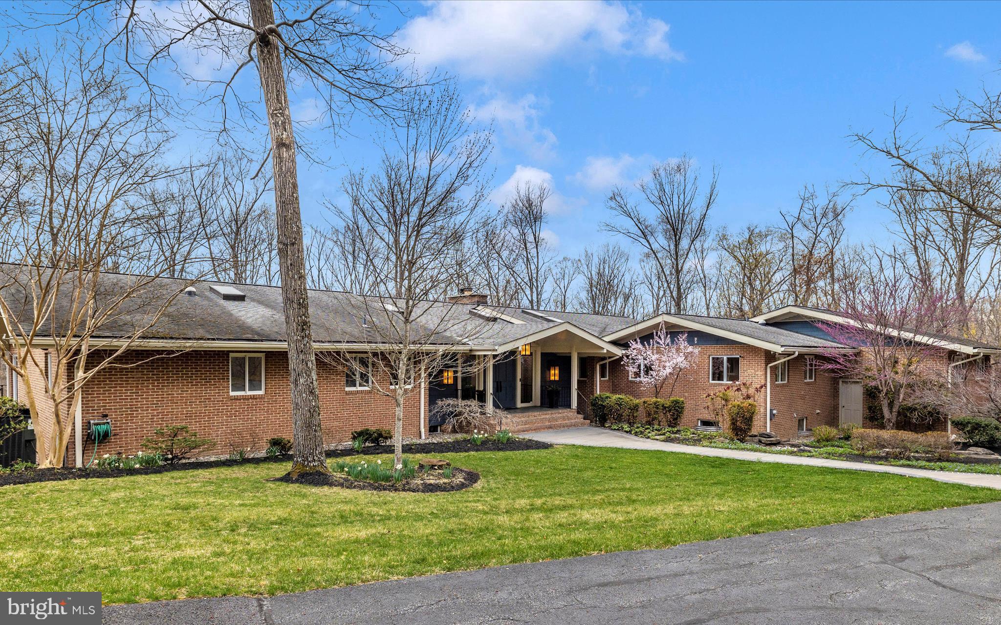 7702 Dance Hall Road Frederick, MD 21701 - Photo 1 of 66 a front view of a house with a garden