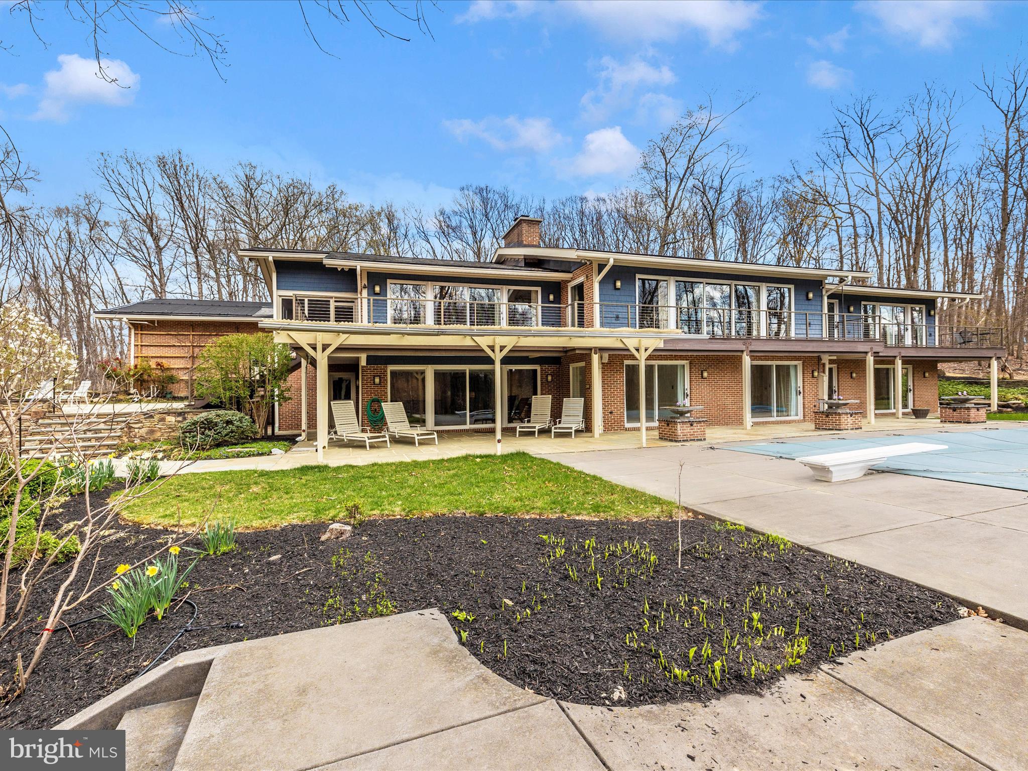 7702 Dance Hall Road Frederick, MD 21701 - Photo 3 of 66 a front view of a house with a yard