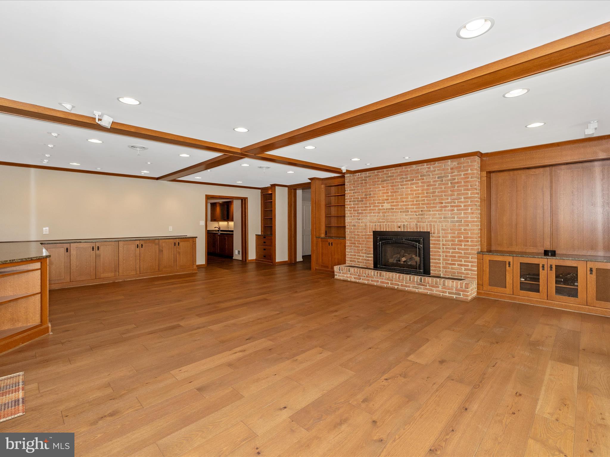 7702 Dance Hall Road Frederick, MD 21701 - Photo 43 of 66 a view of an empty room with a fireplace and a window