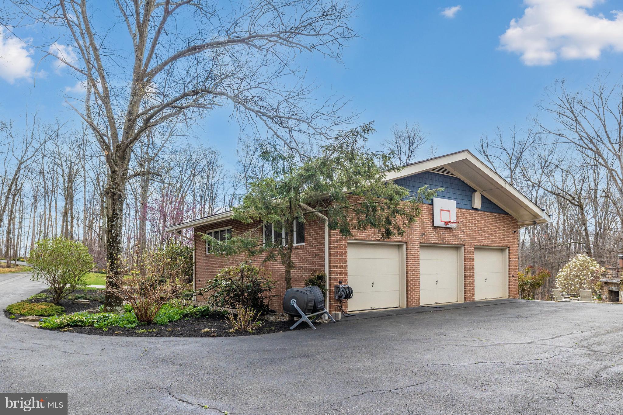 7702 Dance Hall Road Frederick, MD 21701 - Photo 6 of 66 a front view of a house with garden