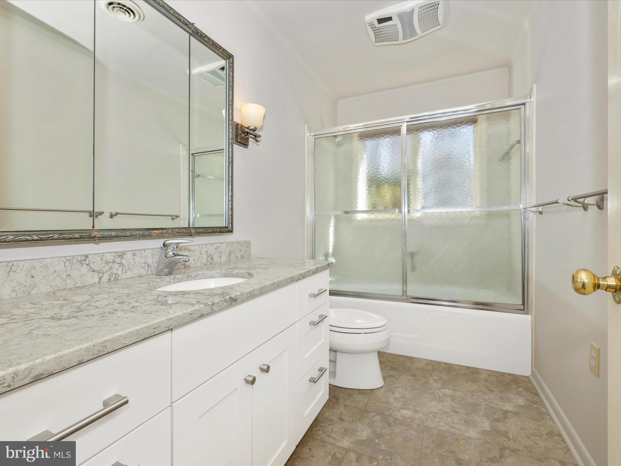 7702 Dance Hall Road Frederick, MD 21701 - Photo 61 of 66 a bathroom with a sink a toilet and shower