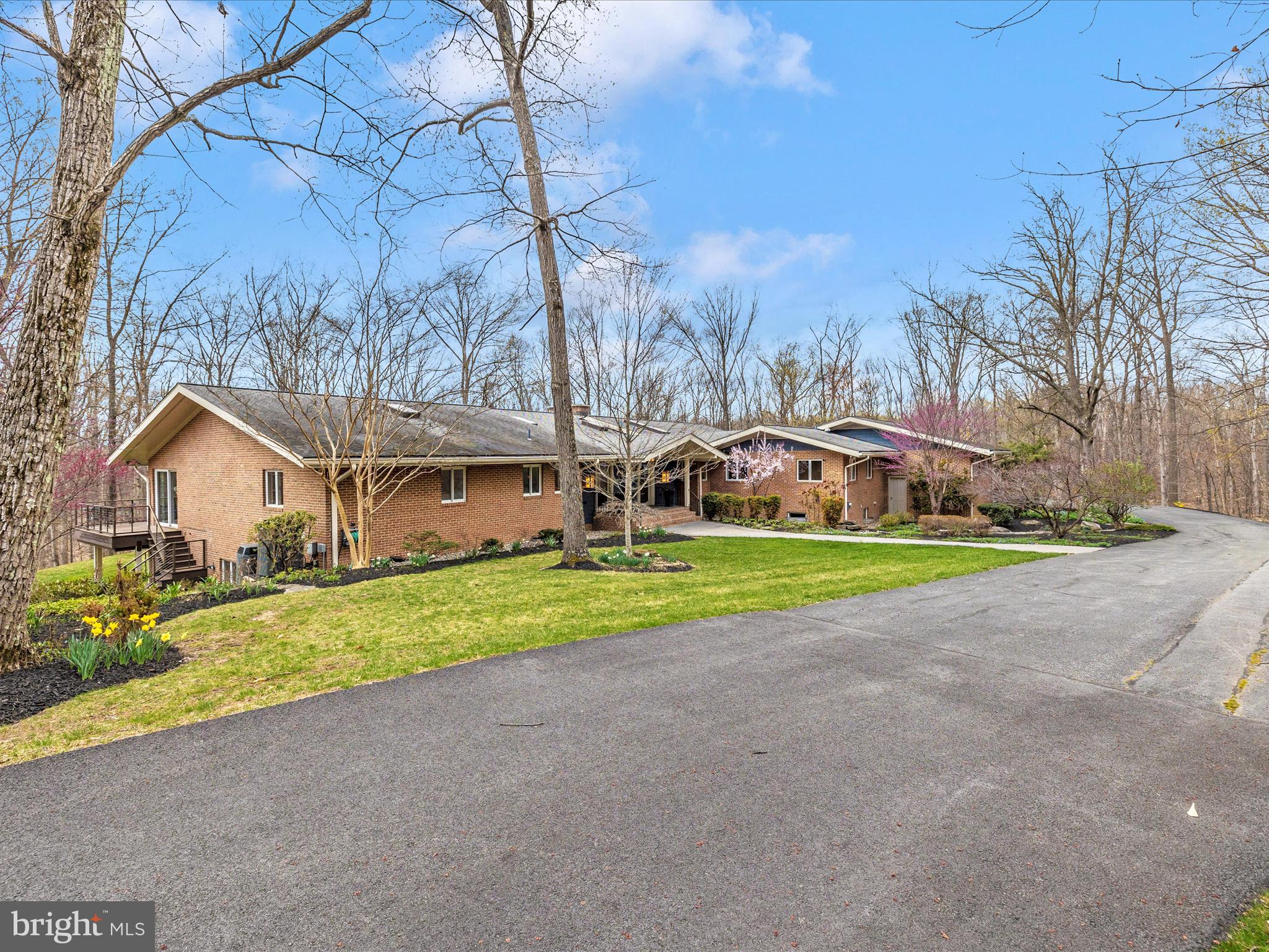 7702 Dance Hall Road Frederick, MD 21701 - Photo 62 of 66 a view of a house with a big yard and large trees