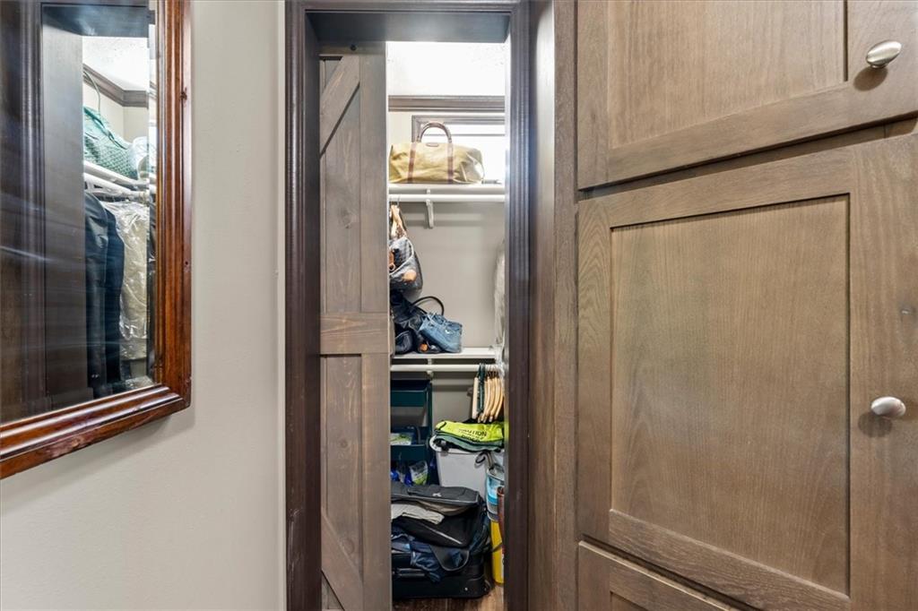 170 Anoia Road Washington, GA 30673 - Photo 19 of 46 a room with storage and utility