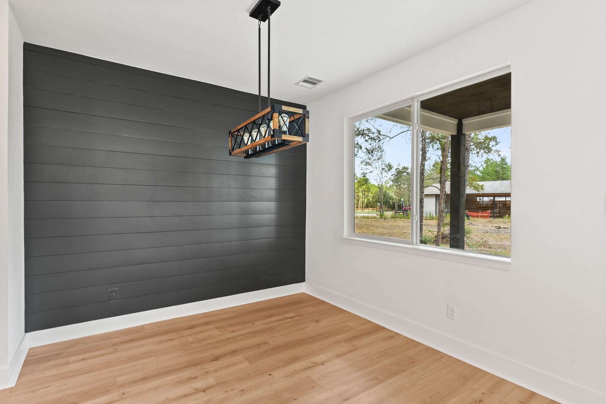 17068 Lively Road Waller, TX 77484 - Photo 9 of 29 a view of an empty room with a window