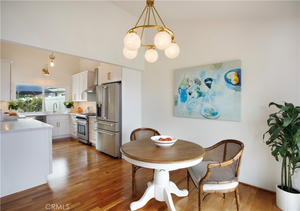 33525 Sextant Dana Point, CA 92629 - Photo 13 of 51 a view of a dining room with furniture and wooden floor