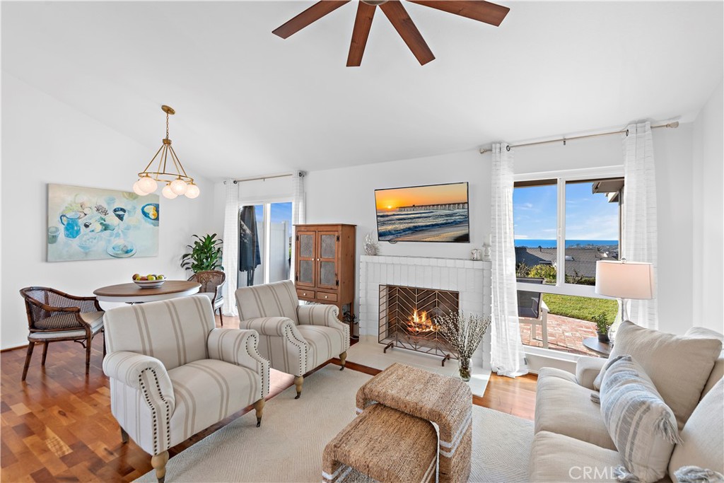 33525 Sextant Dana Point, CA 92629 - Photo 14 of 51 a living room with furniture and a fireplace