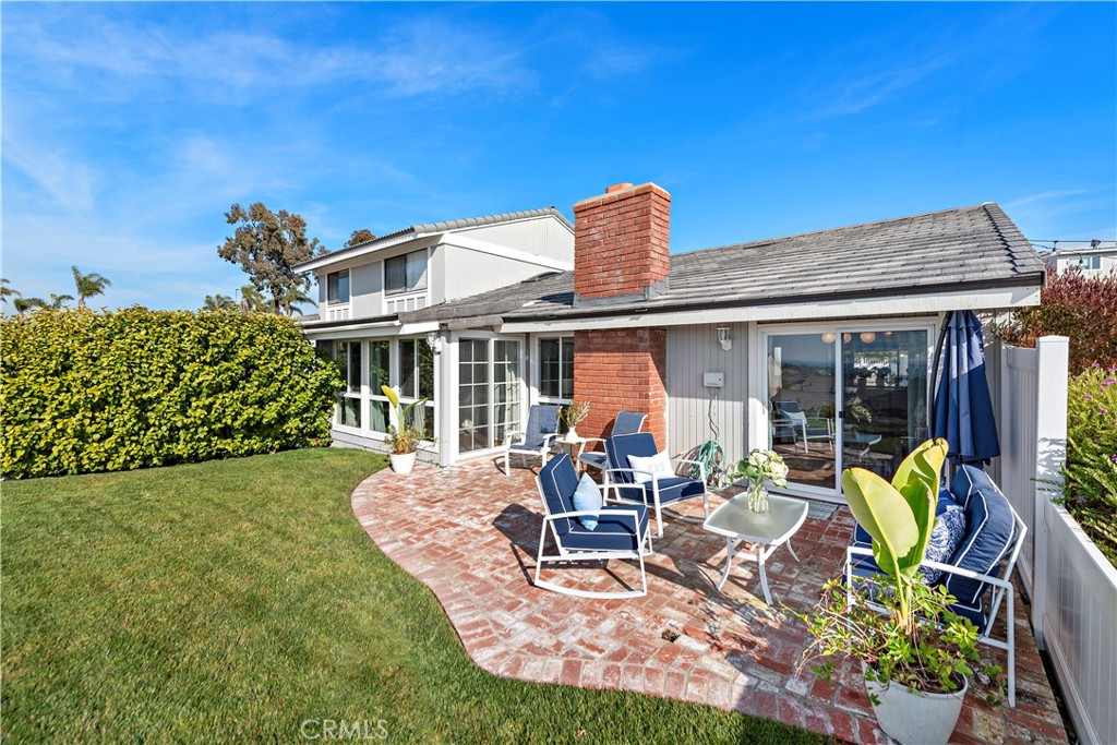 33525 Sextant Dana Point, CA 92629 - Photo 28 of 51 a view of a house with backyard porch and sitting area