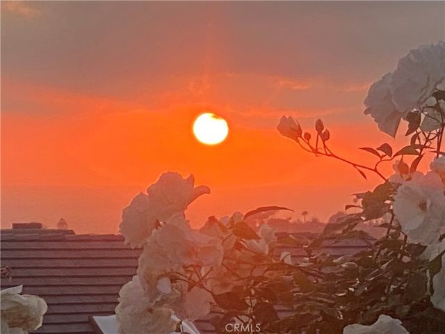 a kitchen with stove and cabinets