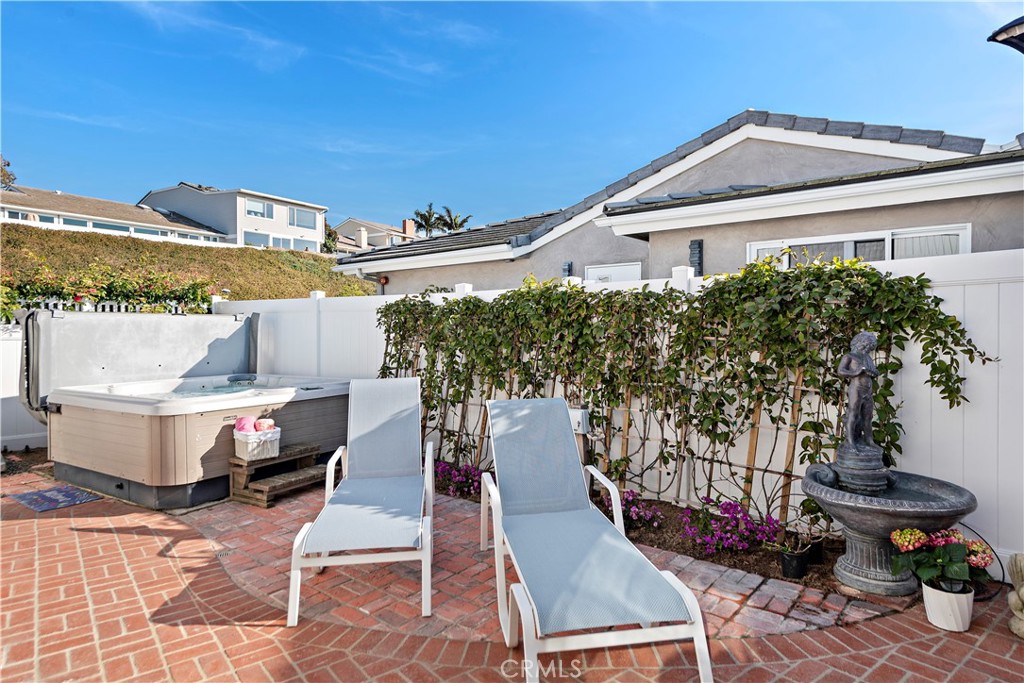 33525 Sextant Dana Point, CA 92629 - Photo 8 of 51 a front view of a house with garden