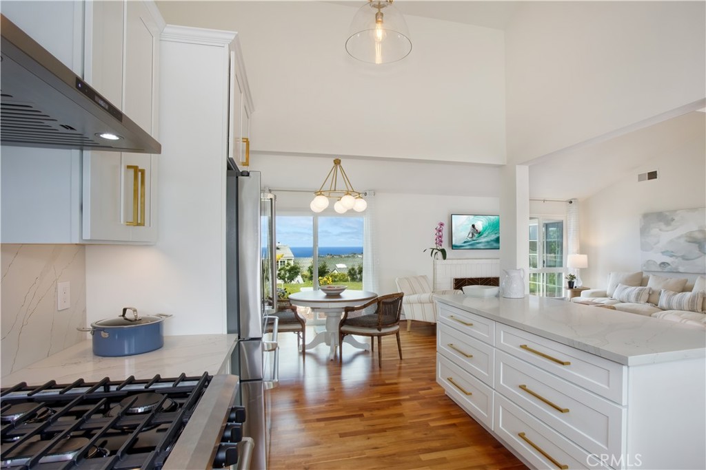33525 Sextant Dana Point, CA 92629 - Photo 10 of 51 a kitchen with stove and cabinets