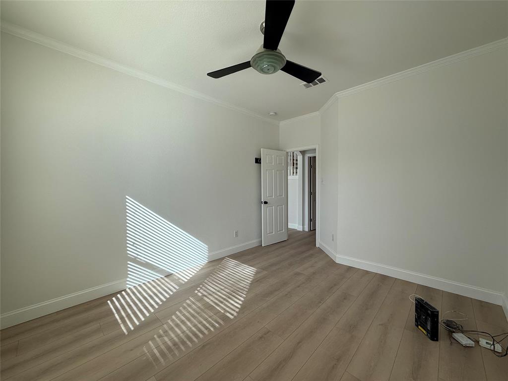 2254 Ash Grove Way Dallas, TX 75228 - Photo 13 of 23 a view of an empty room and window