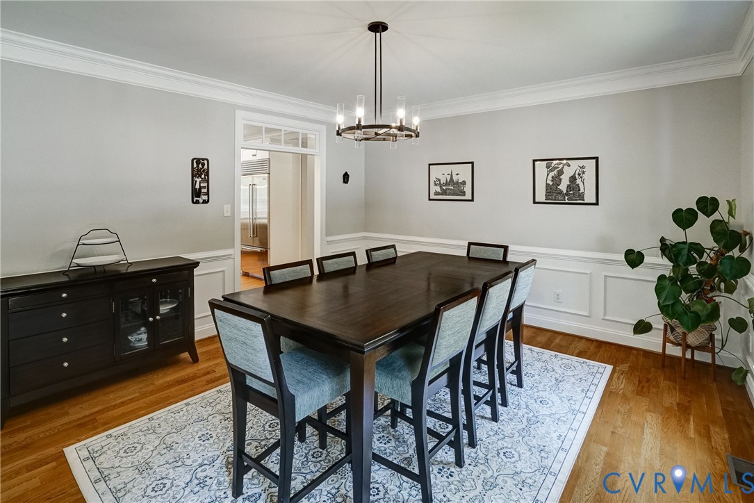 1295 Hermitage Road Manakin-Sabot, VA 23103 - Photo 34 of 55 a dining room with a table and chairs