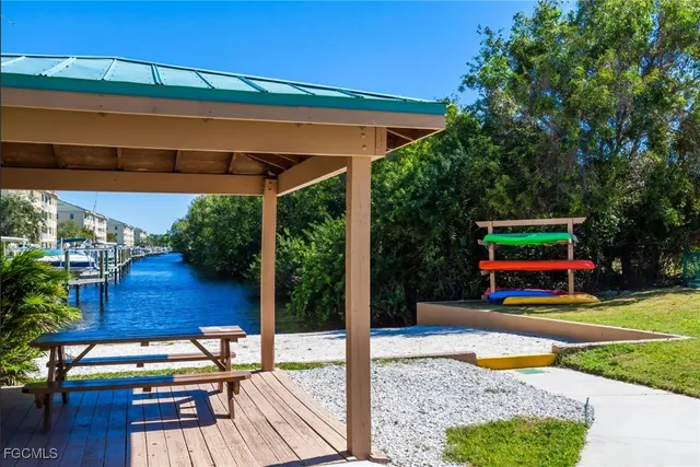 a view of swimming pool with a patio