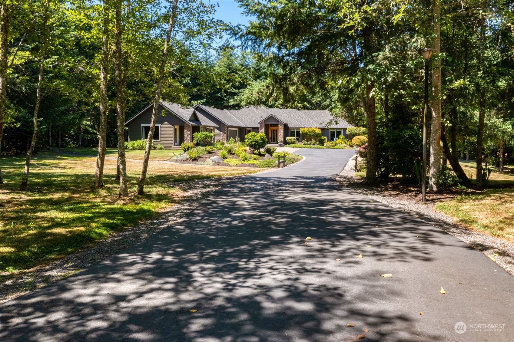 4635 D D Milluhr Road Northeast Olympia, WA 98516 - Photo 1 of 40 a view of a house with a yard