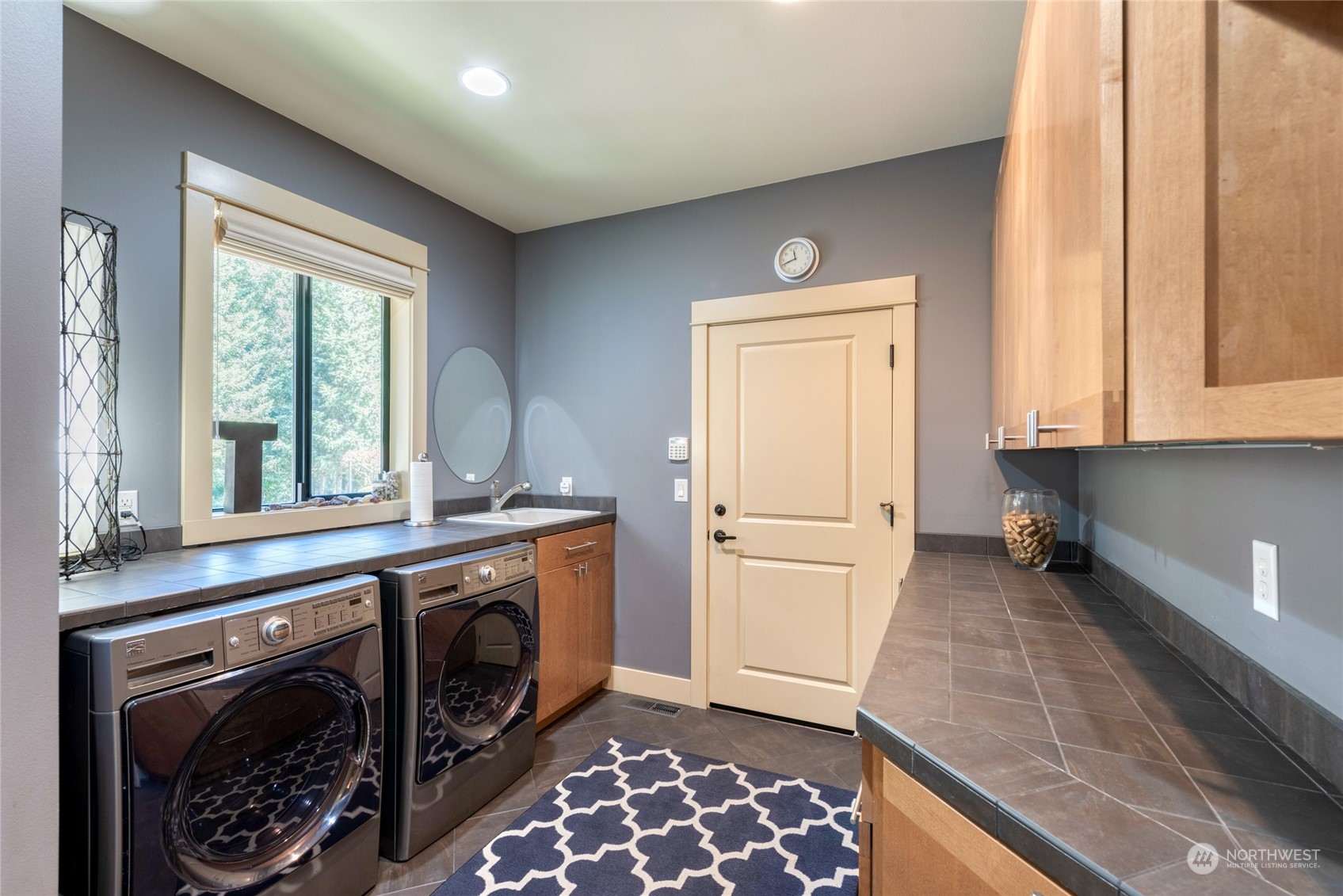 4635 D D Milluhr Road Northeast Olympia, WA 98516 - Photo 12 of 40 a kitchen with a stove and a window