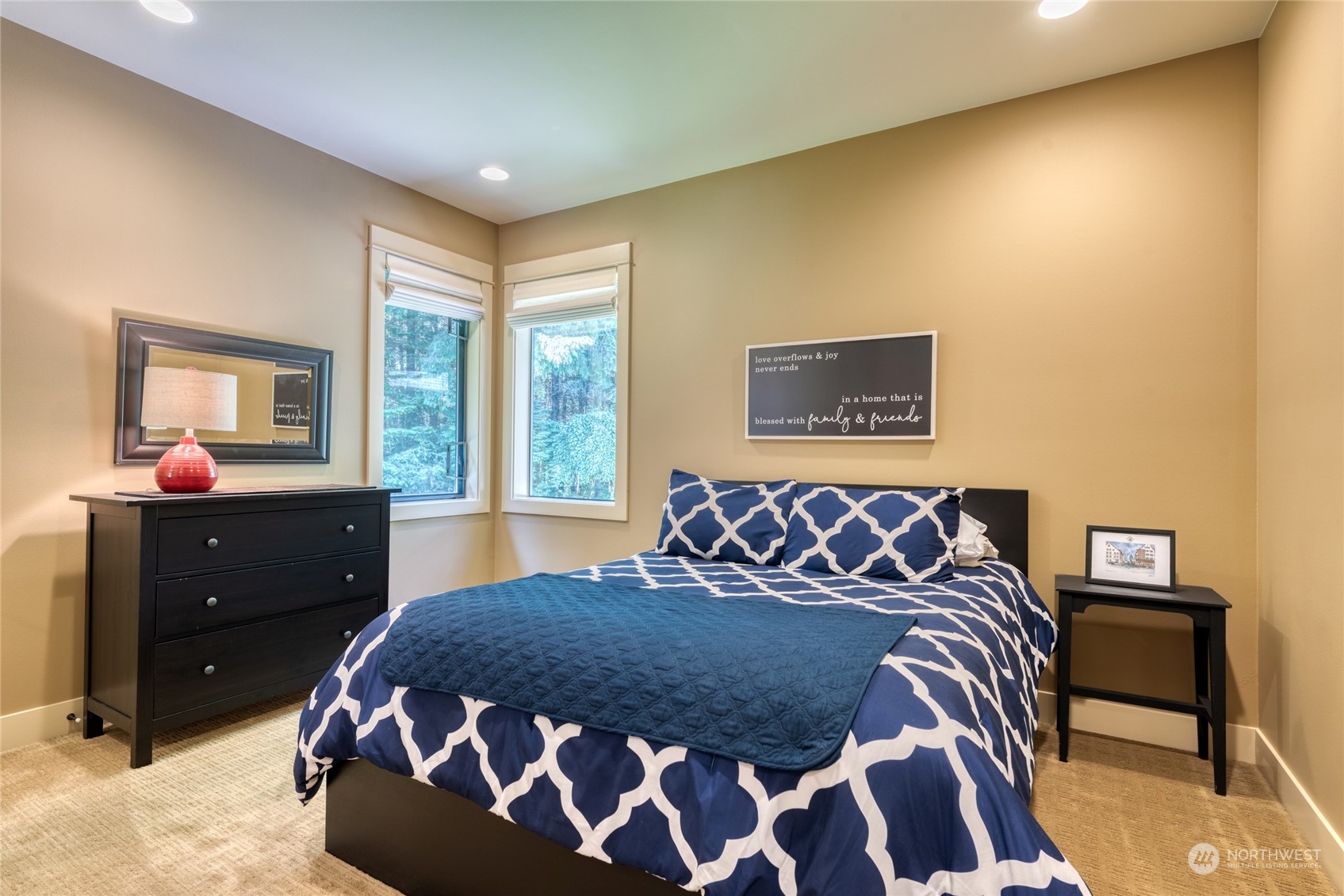 4635 D D Milluhr Road Northeast Olympia, WA 98516 - Photo 13 of 40 a bed sitting in a bedroom next to a window