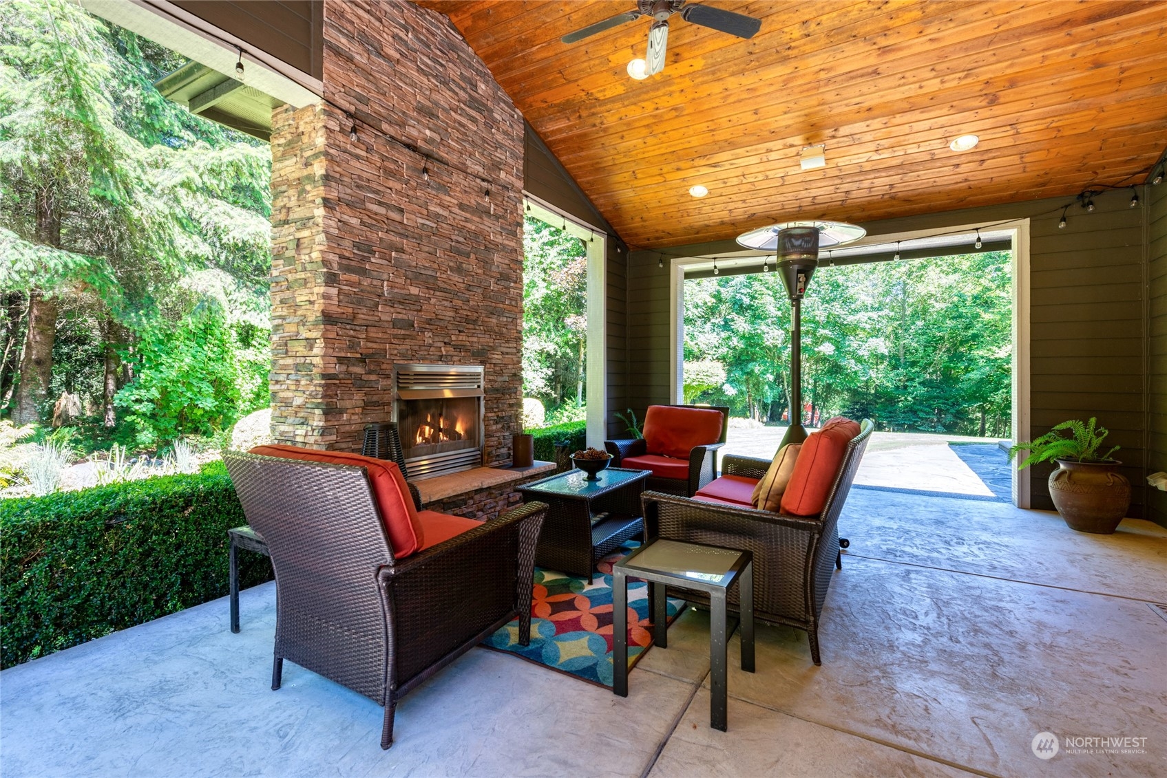 4635 D D Milluhr Road Northeast Olympia, WA 98516 - Photo 19 of 40 a outdoor living space with furniture potted plant and a garden