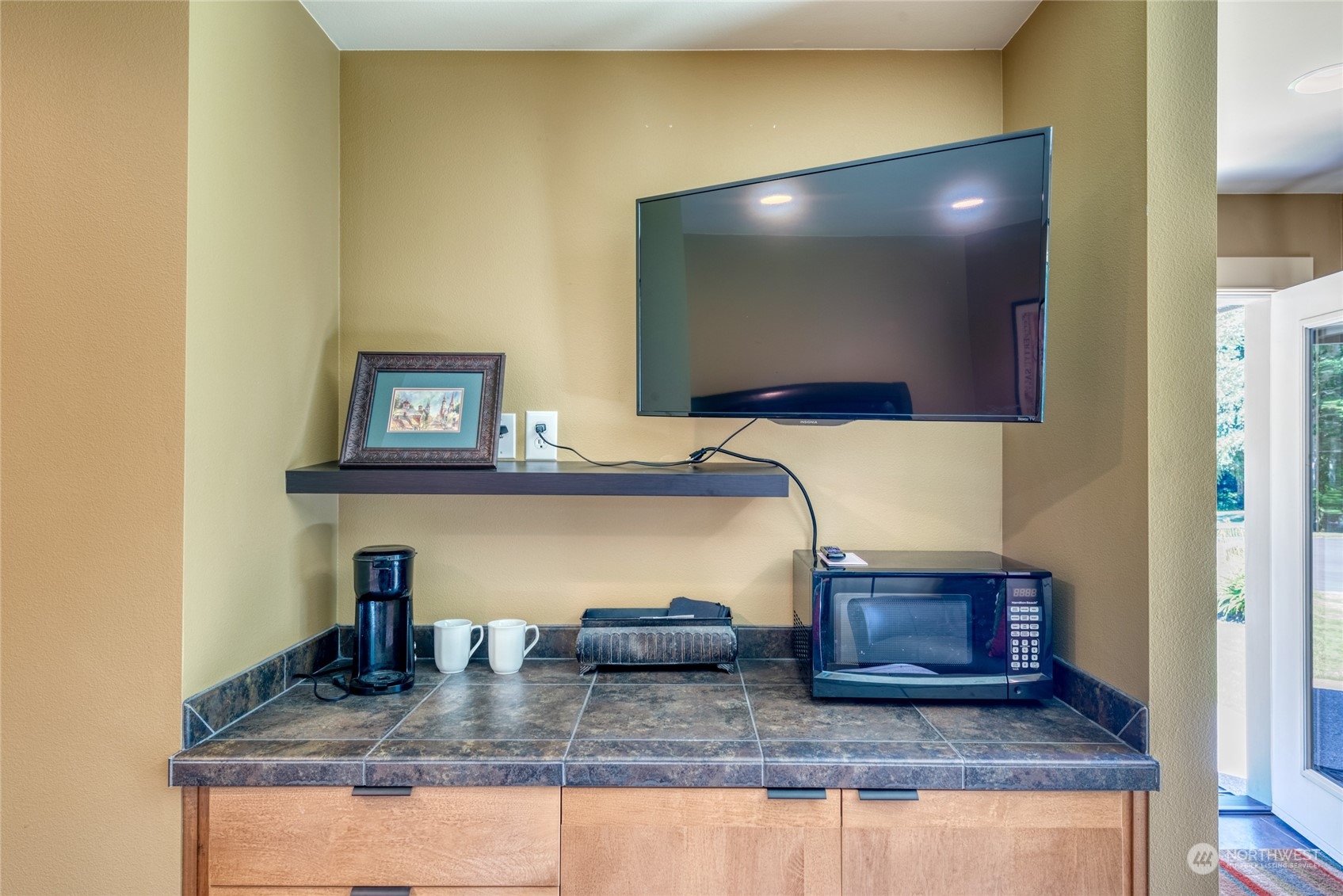 4635 D D Milluhr Road Northeast Olympia, WA 98516 - Photo 28 of 40 a living room with fireplace furniture and a flat screen tv