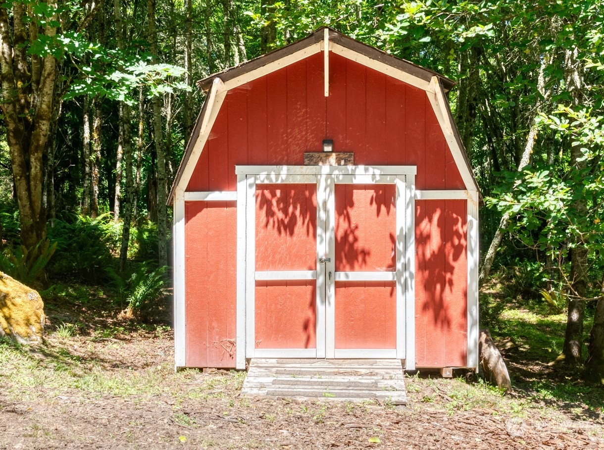 4635 D D Milluhr Road Northeast Olympia, WA 98516 - Photo 31 of 40 a front view of house with yard