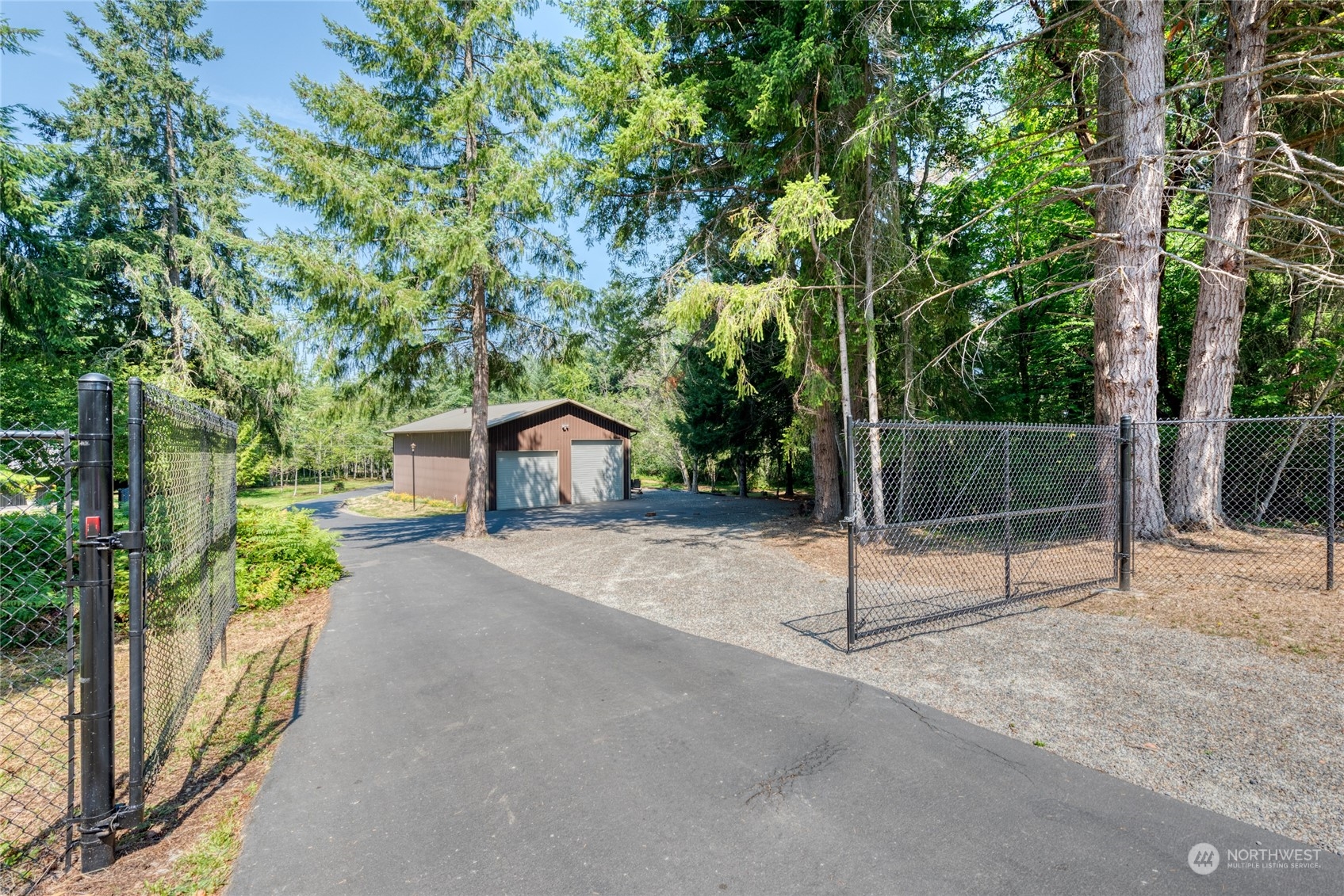 4635 D D Milluhr Road Northeast Olympia, WA 98516 - Photo 35 of 40 a view of a house with a street