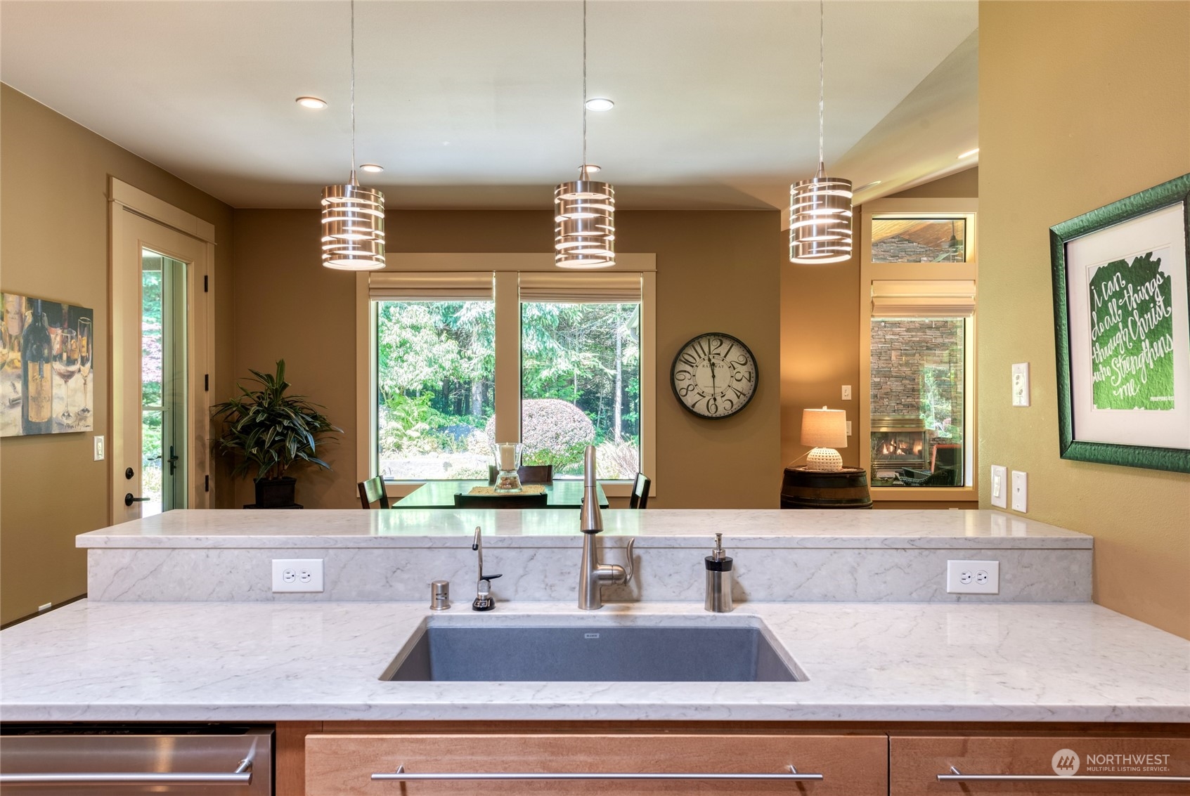 4635 D D Milluhr Road Northeast Olympia, WA 98516 - Photo 4 of 40 a living room with large window and chandelier