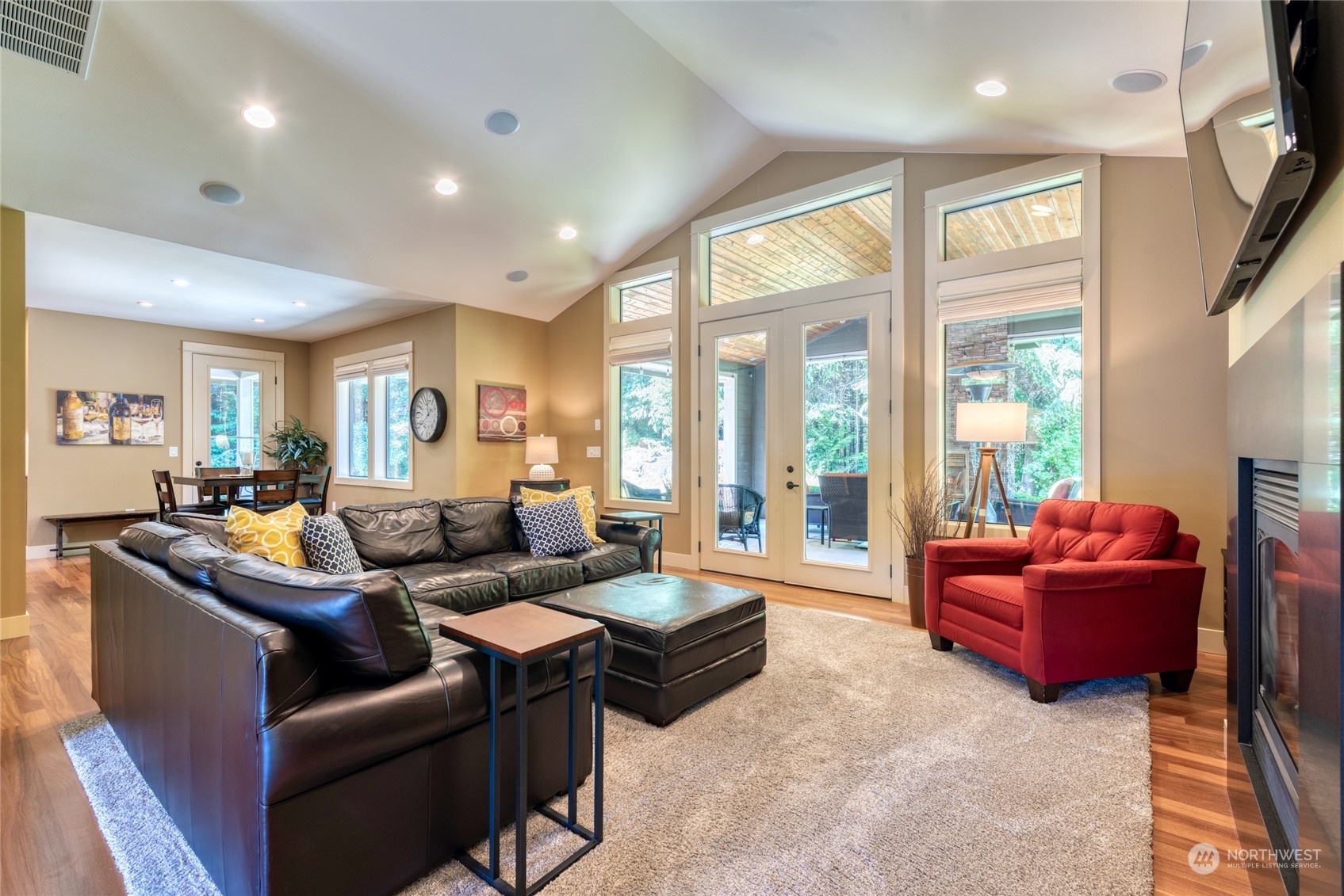 4635 D D Milluhr Road Northeast Olympia, WA 98516 - Photo 9 of 40 a living room with fireplace furniture and a large window