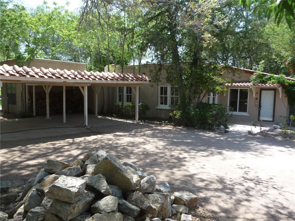 4915 Love Road El Paso, TX 79922 - Photo 1 of 1 a front view of a house with a yard