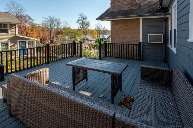 a view of a roof deck with couches