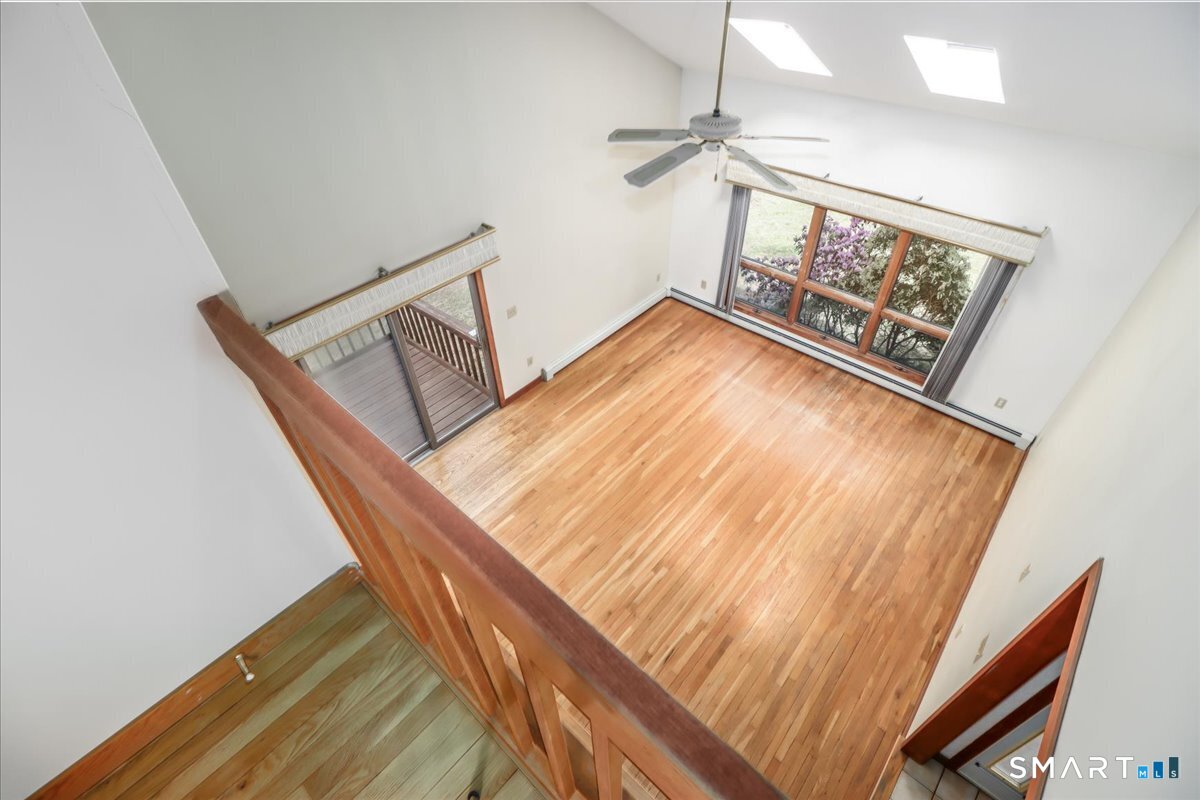 63 North Mountain Road Brookfield, CT 06804 - Photo 21 of 34 looking down from the Primary Bedroom balcony