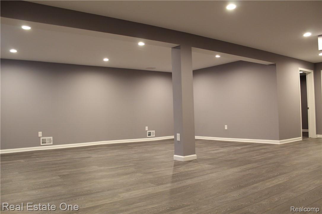 1164 Churchill Circle Rochester, MI 48307 - Photo 16 of 22 21.JPG Lower level family room. Recessed lighting, abundant outlets